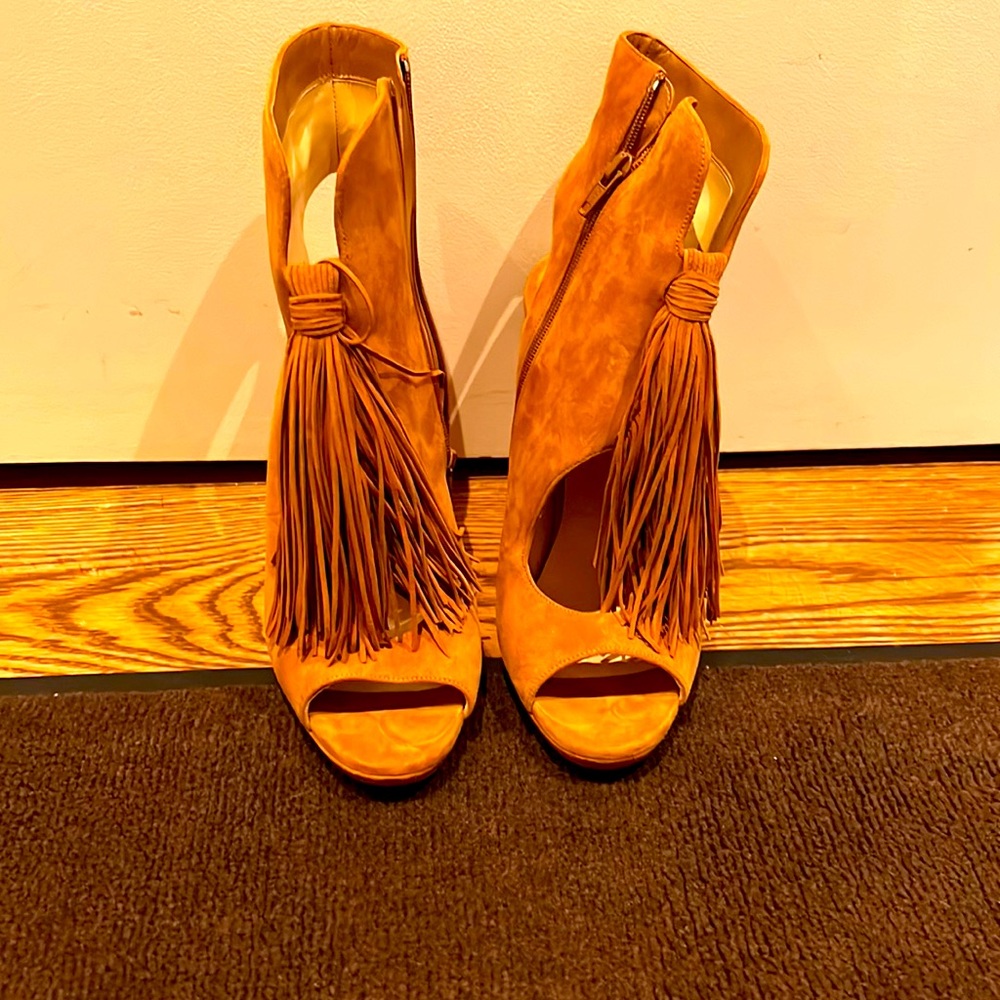 BRAND new pair of Christian Loubiton